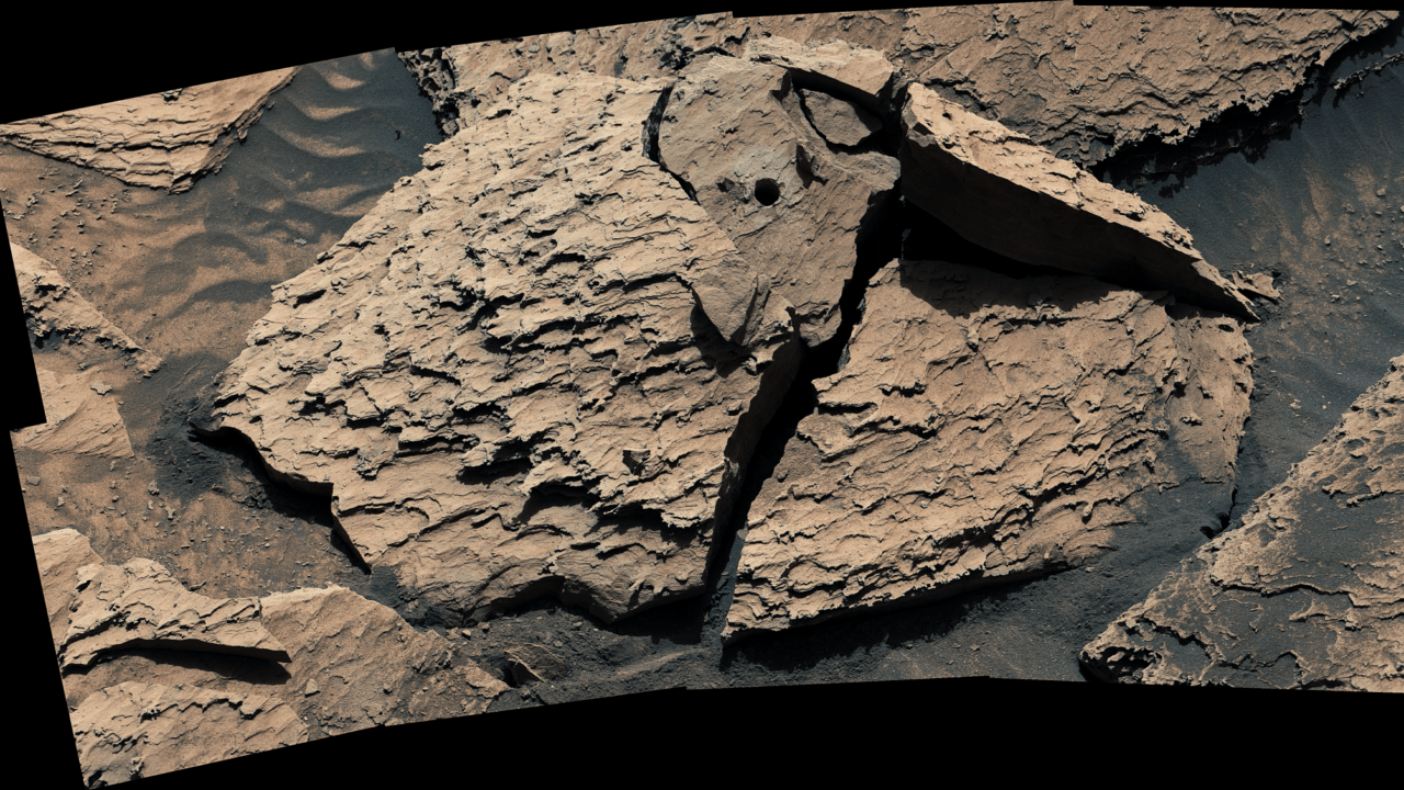 Curiosity Shakes Loose a Pesky Rock